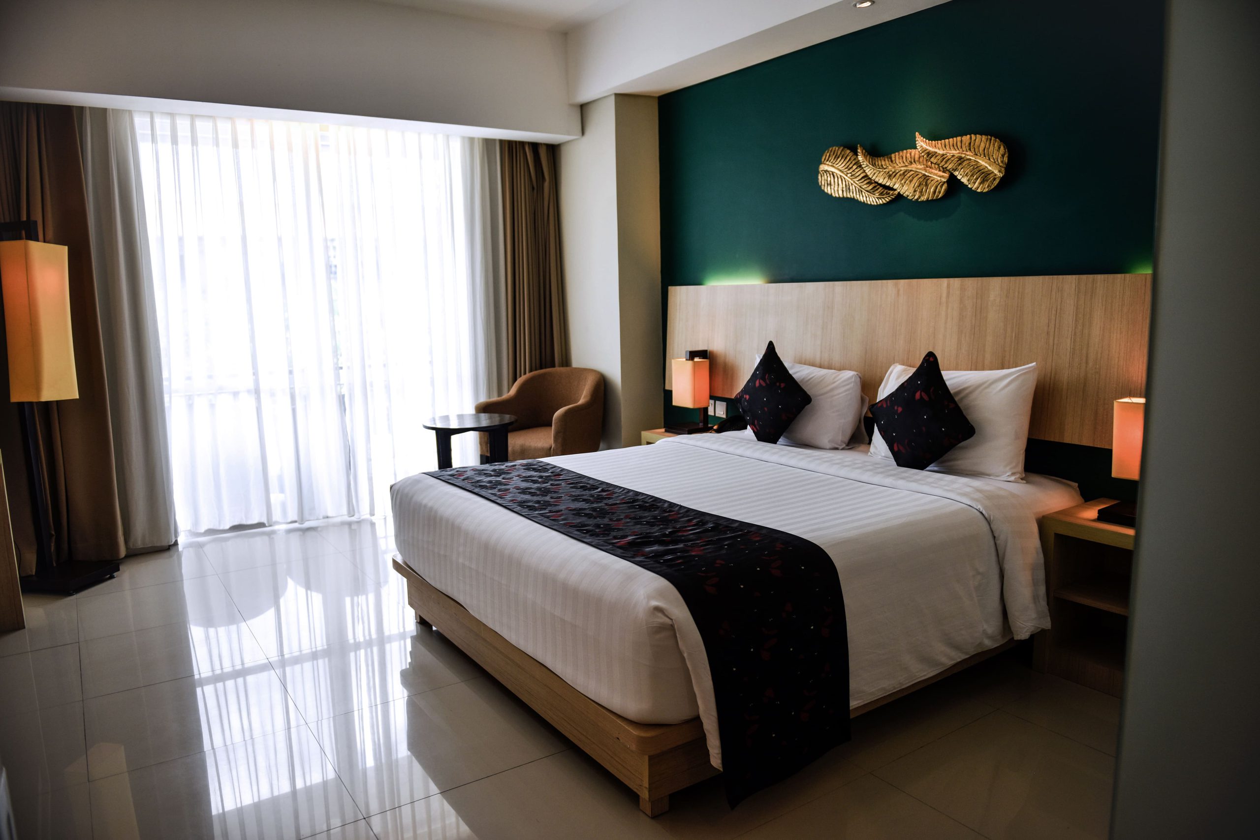 room_deluxe double balcony_the kana kuta hotel